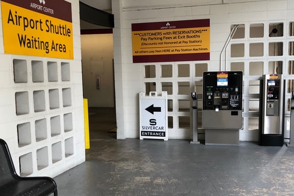SilverCarLaxAtParking